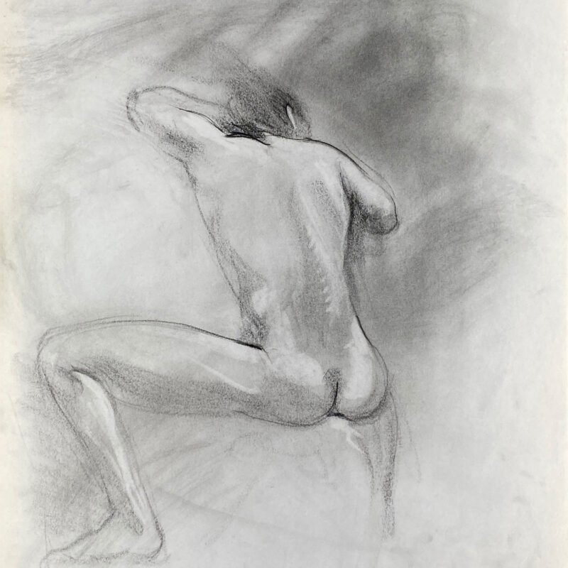 charcoal drawing of sitting male model from backside