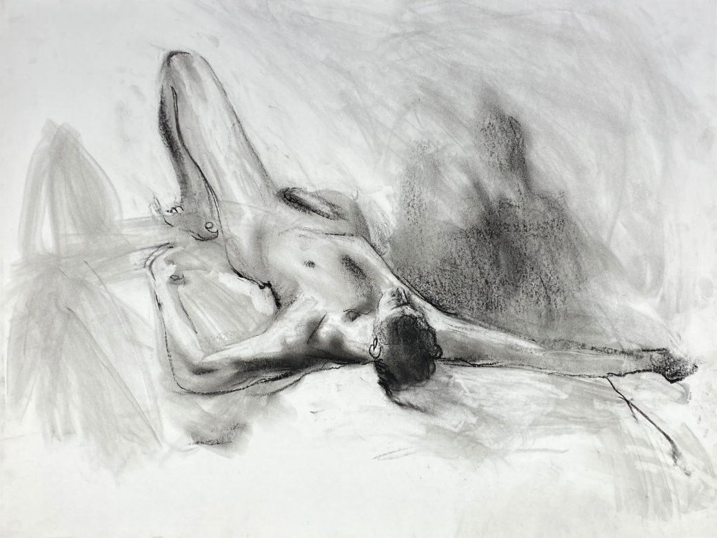 charcoal drawing of male model laying