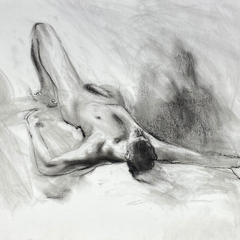 charcoal drawing of male model laying