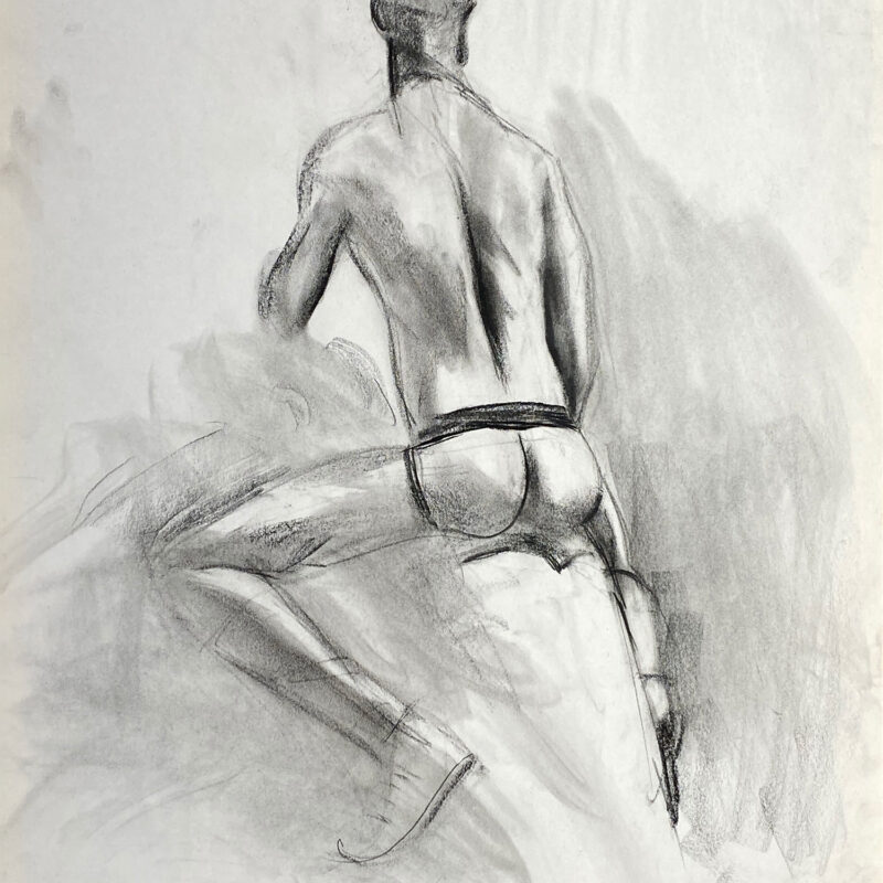 charcoal drawing of male model sitting in jocks from backside