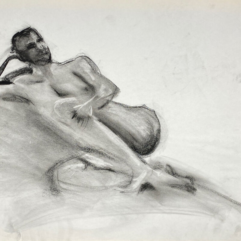 charcoal drawing of male model reclining